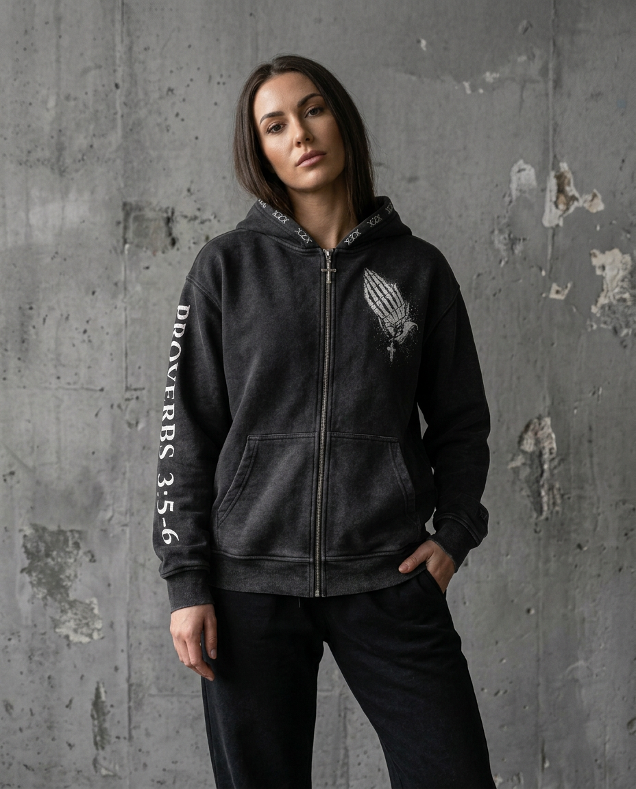 Model wearing the washed black Proverbs zip hoodie — visual preview